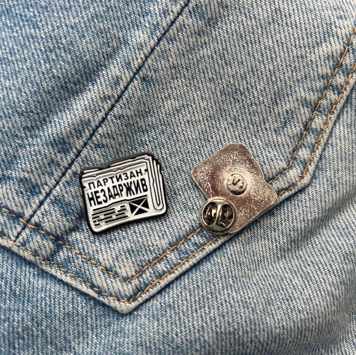 Custom enamel pin on jeans